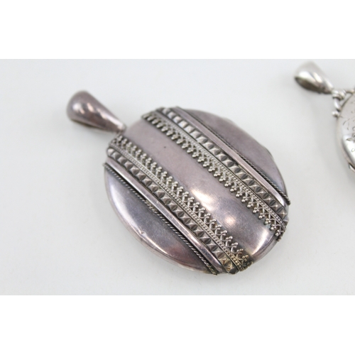 434 - Two Victorian silver decorative lockets (41g)