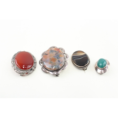 438 - Four silver stone set brooches (50g)