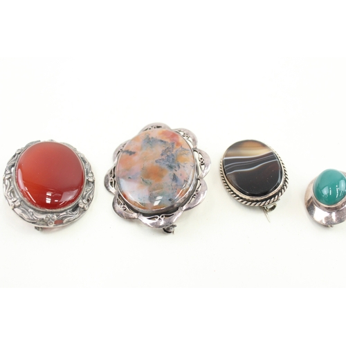 438 - Four silver stone set brooches (50g)