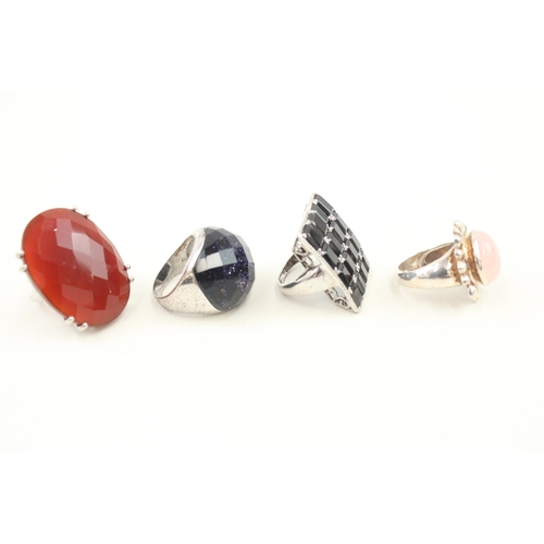 443 - Four statement silver stone set rings (61g)