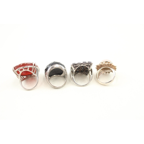 443 - Four statement silver stone set rings (61g)