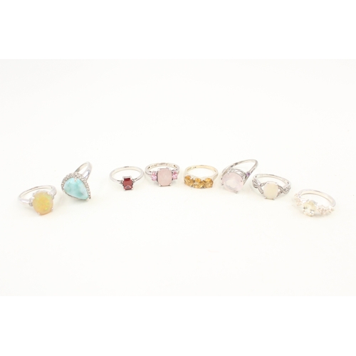 449 - A collection of silver stone set rings including larrimar and opal (29g)