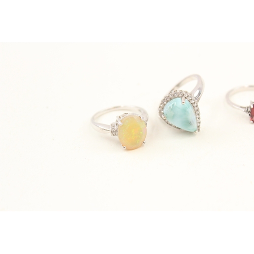 449 - A collection of silver stone set rings including larrimar and opal (29g)