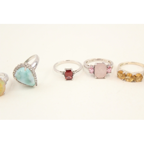 449 - A collection of silver stone set rings including larrimar and opal (29g)