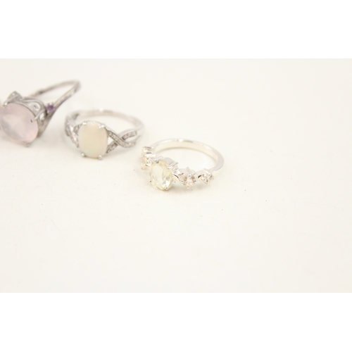 449 - A collection of silver stone set rings including larrimar and opal (29g)