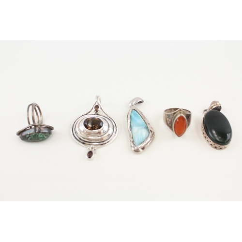 455 - A collection of silver gemstone set pendants (50g)