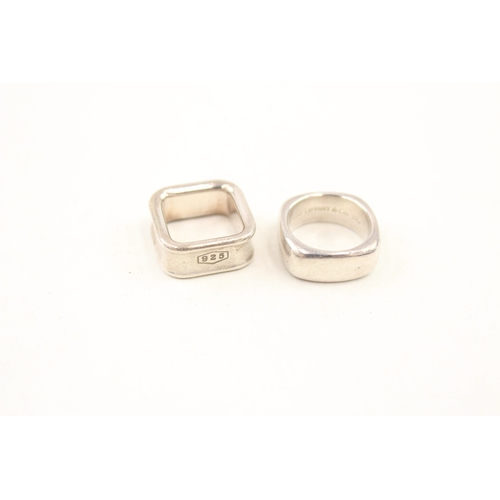 458 - Two silver rings by Tiffany and Co (19g)