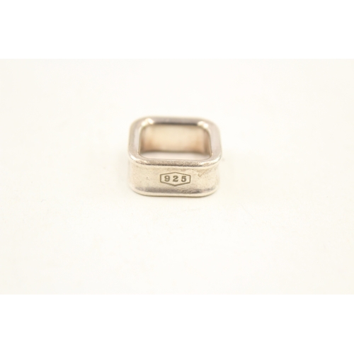 458 - Two silver rings by Tiffany and Co (19g)