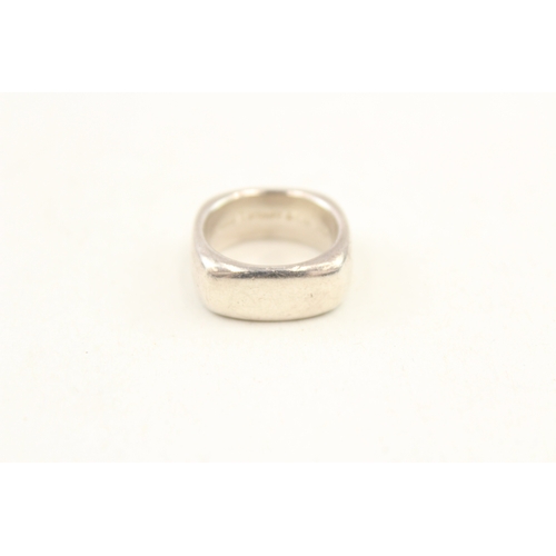 458 - Two silver rings by Tiffany and Co (19g)