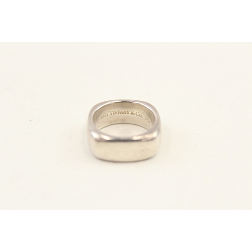 458 - Two silver rings by Tiffany and Co (19g)