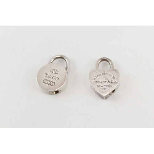 459 - Two silver padlock pendants by Tiffany and Co (18g)