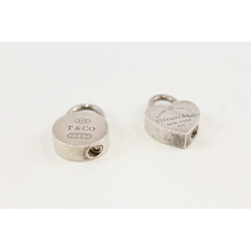 459 - Two silver padlock pendants by Tiffany and Co (18g)