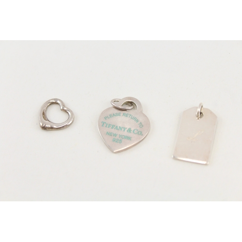 467 - Three silver pendants by Tiffany and Co (13g)