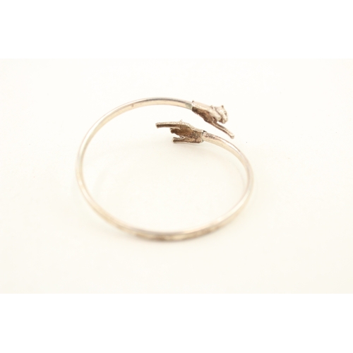 477 - Two silver bypass bangles (23g)