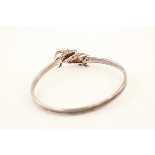 477 - Two silver bypass bangles (23g)