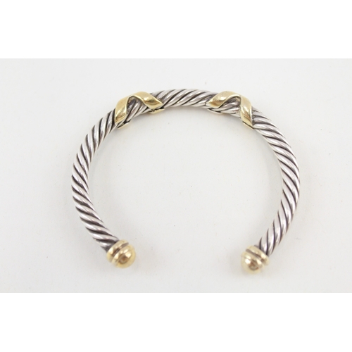 481 - A silver Links of London bangle with gold detailing (34g)