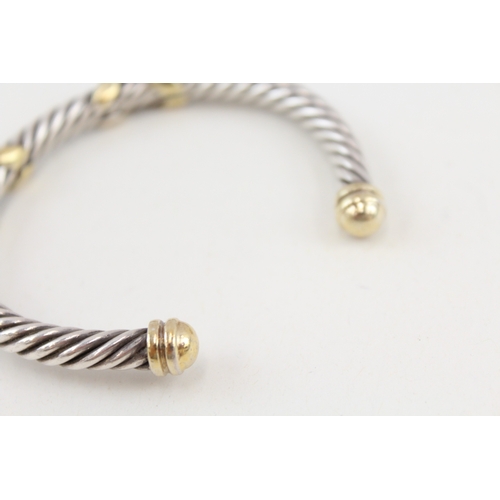 481 - A silver Links of London bangle with gold detailing (34g)