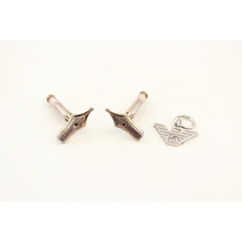 483 - A pair of silver cufflinks by Mont Blanc and an Armani pendant (10g)