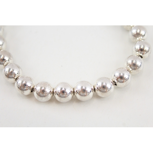 484 - A silver beaded bracelet by Tiffany and Co (22g)