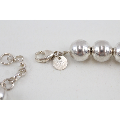 484 - A silver beaded bracelet by Tiffany and Co (22g)