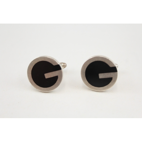 485 - A pair of silver cufflinks by Gucci (24g)