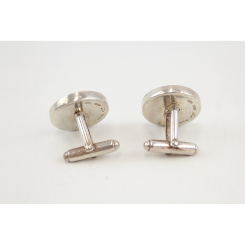 485 - A pair of silver cufflinks by Gucci (24g)