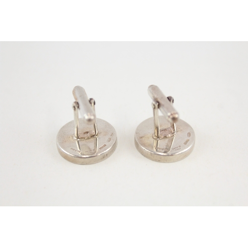 485 - A pair of silver cufflinks by Gucci (24g)