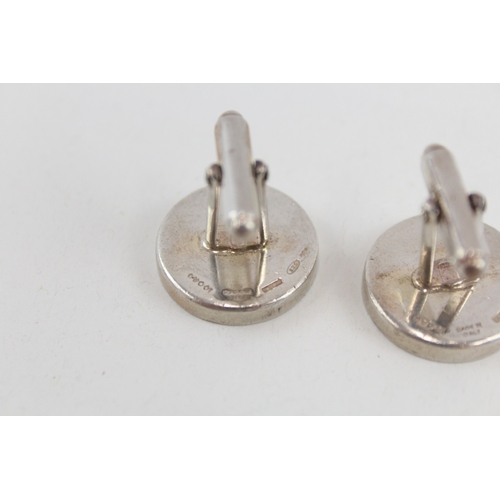 485 - A pair of silver cufflinks by Gucci (24g)