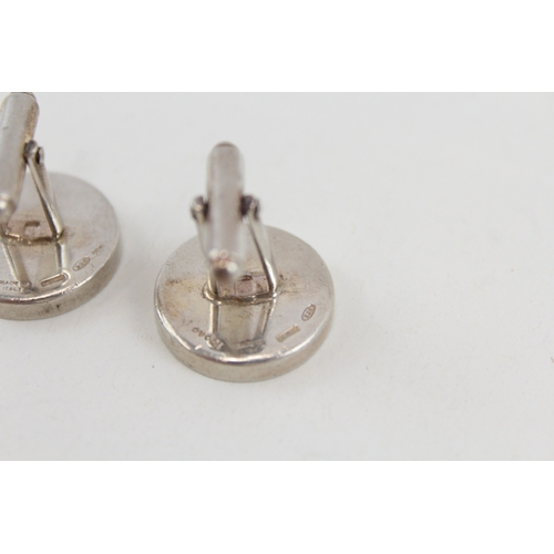 485 - A pair of silver cufflinks by Gucci (24g)