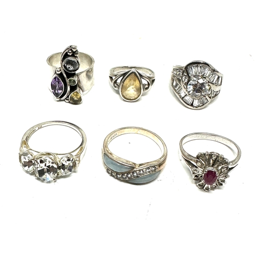 386 - 6 silver gemstone set rings