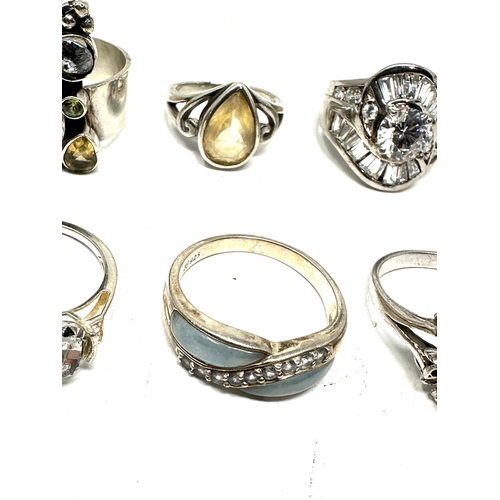 386 - 6 silver gemstone set rings