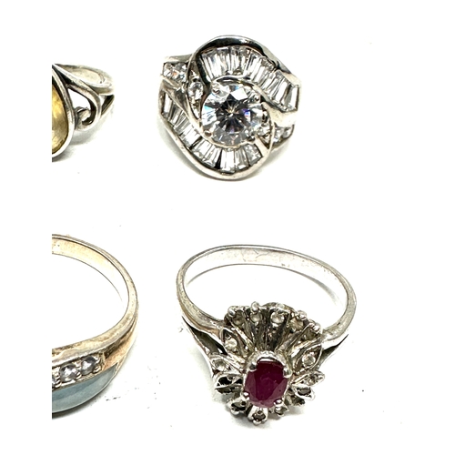 386 - 6 silver gemstone set rings