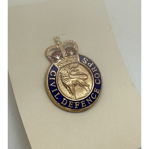 563 - 20 Vintage enamelled Civil Defence Corps lapel badges in original wrapping paper.  Manufactured by J... 