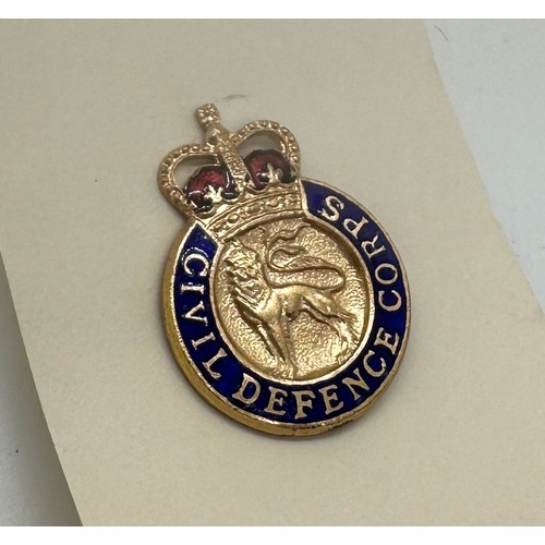 563 - 20 Vintage enamelled Civil Defence Corps lapel badges in original wrapping paper.  Manufactured by J... 