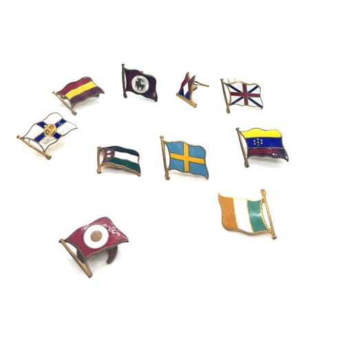 570 - 10 different vintage enamelled shipping line lapel badge flags