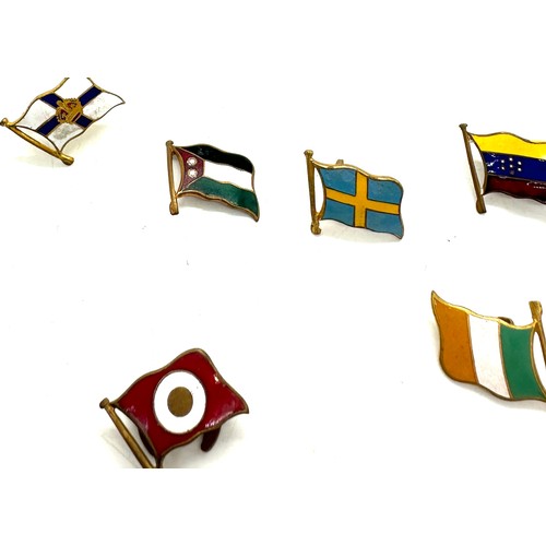 570 - 10 different vintage enamelled shipping line lapel badge flags