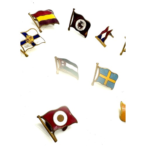 570 - 10 different vintage enamelled shipping line lapel badge flags