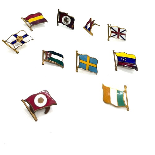 570 - 10 different vintage enamelled shipping line lapel badge flags