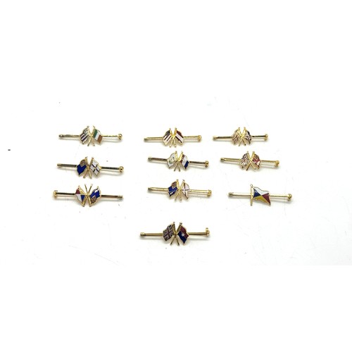 572 - 10 Shipping line tie clips with different enamelled shipping line flags