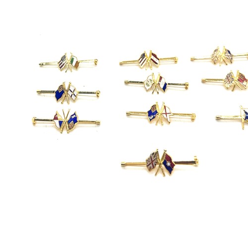 572 - 10 Shipping line tie clips with different enamelled shipping line flags