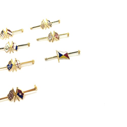 572 - 10 Shipping line tie clips with different enamelled shipping line flags