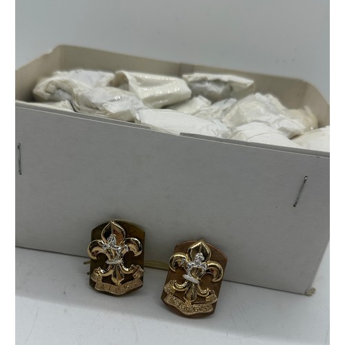 557 - Dealers lot - 50 pairs of King's Regiment collar badges complete with backing plates and pins