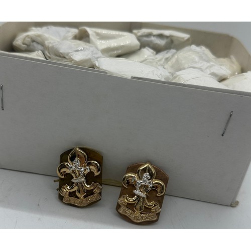 557 - Dealers lot - 50 pairs of King's Regiment collar badges complete with backing plates and pins