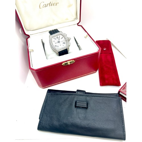 447 - Boxed Mens Cartier Roadster chronograph wristwatch model 2618, with calf black strap, additional met... 