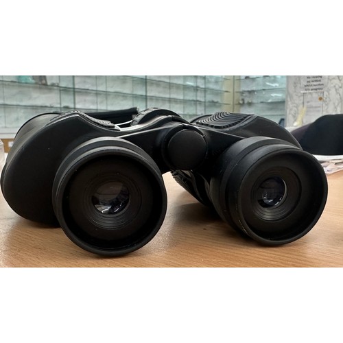 23 - Set of 8-24x50 Zoom binoculars