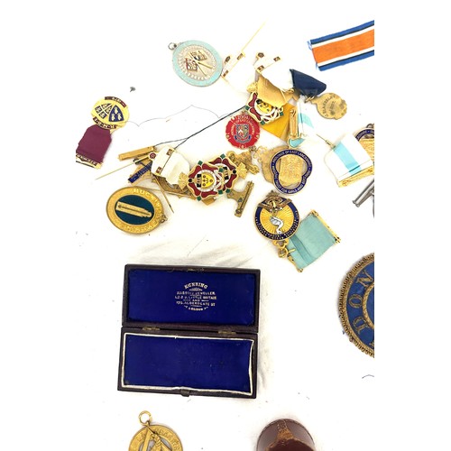 86 - Selection of Masonic items to include medals and cloth badges etc all in a Masonic leather briefcase... 