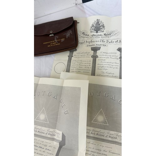 20 - Selection of masonic aprons and memorabilia in a masonic leather briefcase initialed JRJ