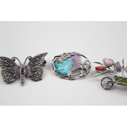 393 - Four silver brooches including Pat Cheney (19g)