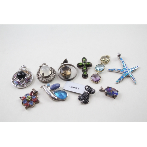 395 - A collection of silver gemstone pendants including Diamond (44g)