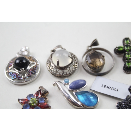 395 - A collection of silver gemstone pendants including Diamond (44g)